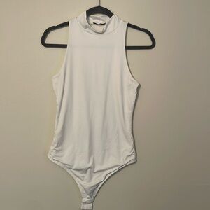White turtle neck bodysuit